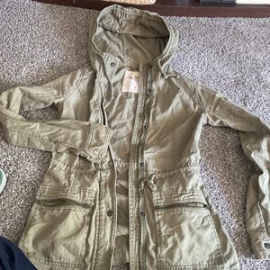 Faded light green in color. Still great condition